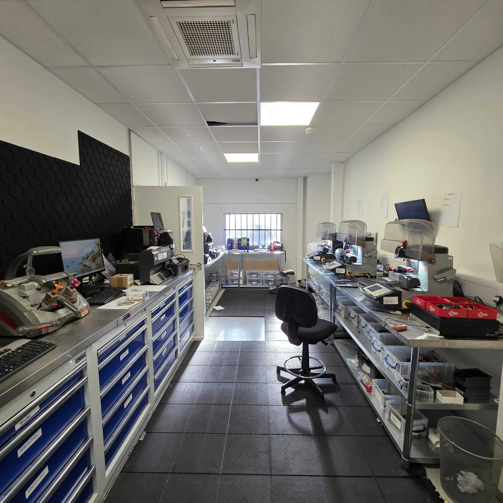 Specialist key-cutting machines and equipment in the Lock & Key workshop